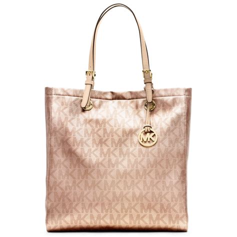 michael kors rose gold metallic purse|michael kors large gold tote.